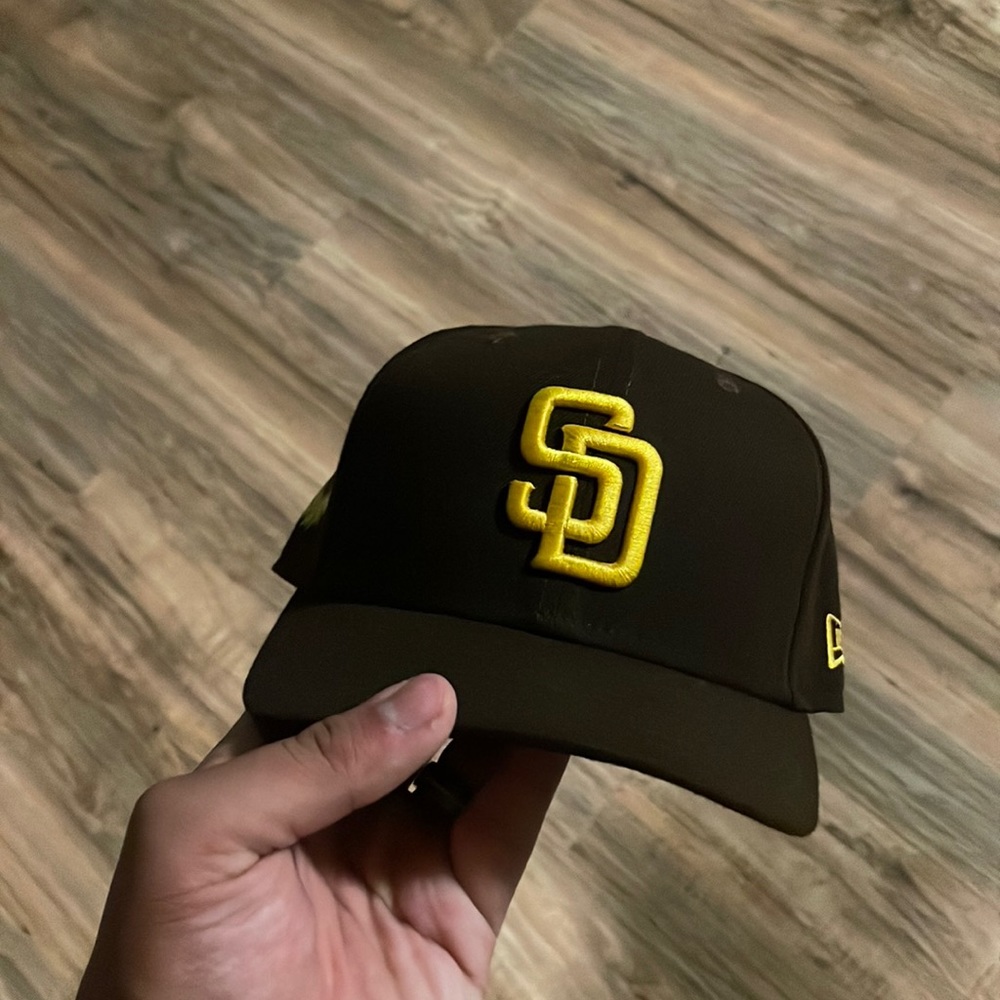San Diego Pandres on-field with sunflower embroidery.